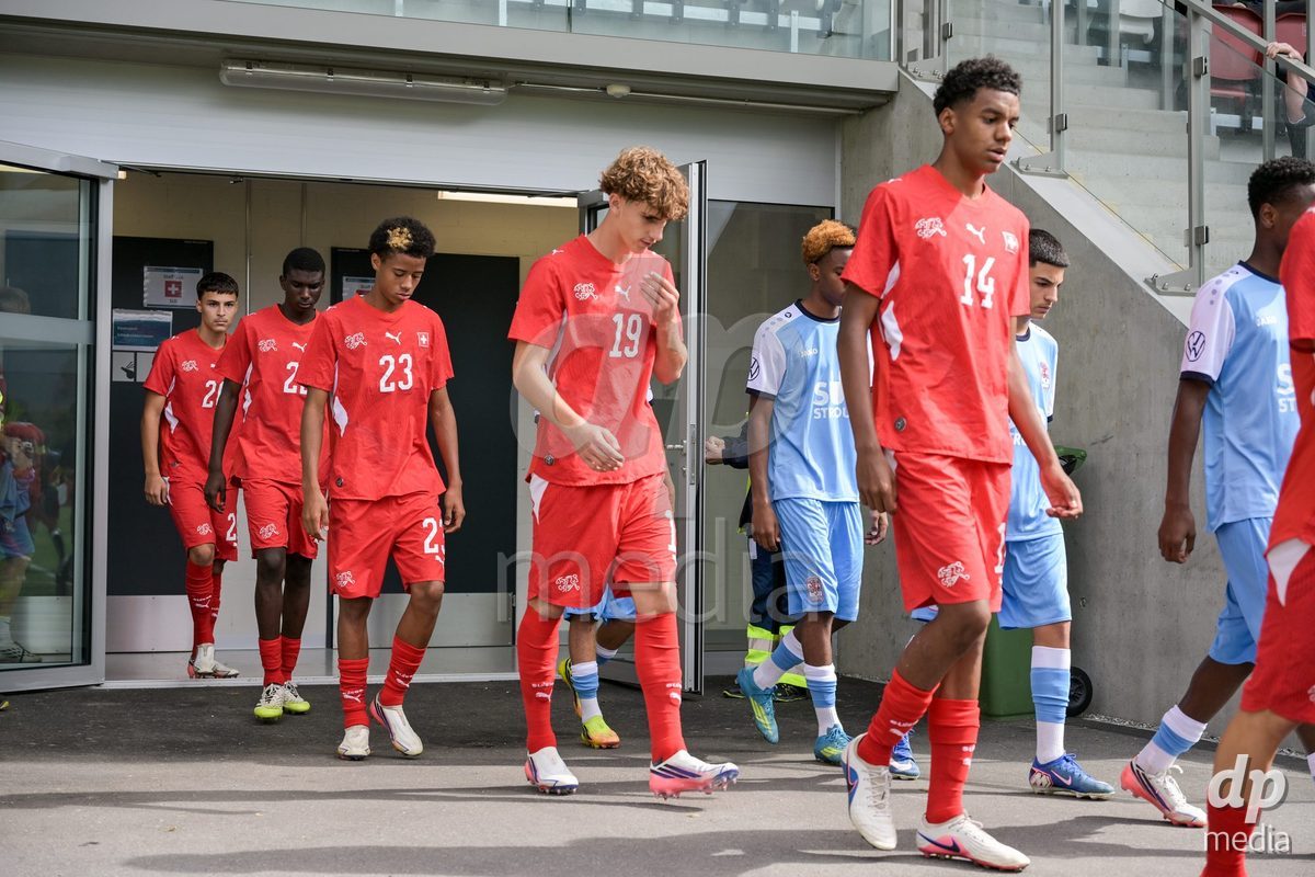CHUR, SWITZERLAND - September 10: The players enter the field during the International friendly match between Switzerland U16 and Luxembourg U16 at Stade de Chur on September 10,2026 in Chur, Switzerland