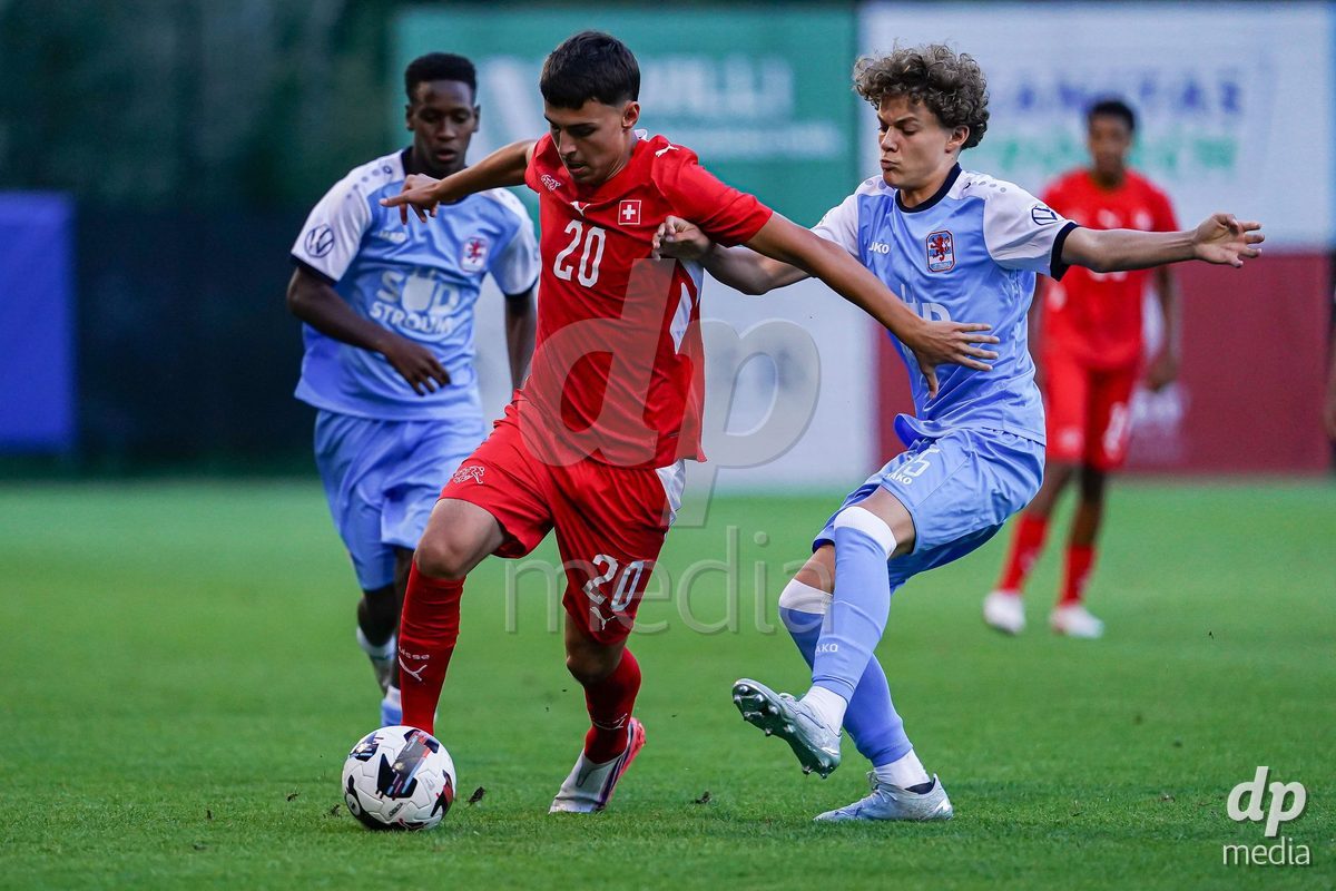 OBERE AU, Switzerland - September 8: Dylan Servais of Luxembourg (R) and Marin Ivankovic of Switzerland (L) battle for the ball during the International Friendly U20 match between Switzerland and Luxembourg at TBD on September 8, 2026 in Obere Au, Switzerland.