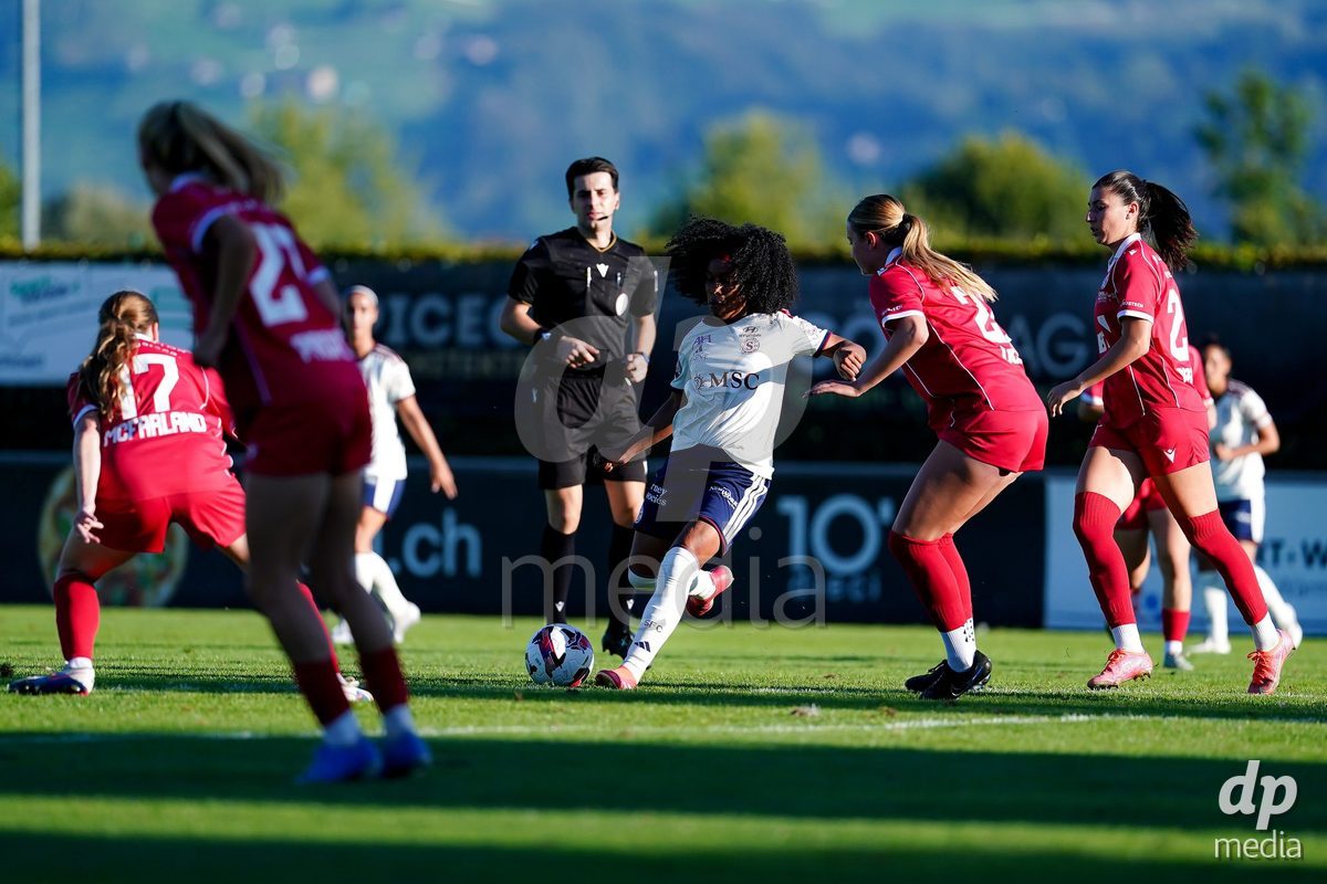 Rapperswil, Switzerland - September 12: Mickaella Cardia (Mickaëlla Cardia) of Servette FC Chenois Feminin battles for the ball during the AXA Women's Super League match between FC Rapperswil-Jona and Servette FC Chenois Feminin at Stadion Grünfeld on September 12, 2026 in Rapperswil, Switzerland.
