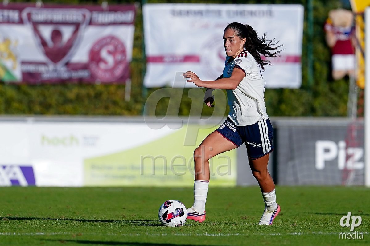 Rapperswil, Switzerland - September 12: Amina Muratovic (Amina Muratović) of Servette FC Chenois Feminin controls the ball during the AXA Women's Super League match between FC Rapperswil-Jona and Servette FC Chenois Feminin at Stadion Grünfeld on September 12, 2026 in Rapperswil, Switzerland.