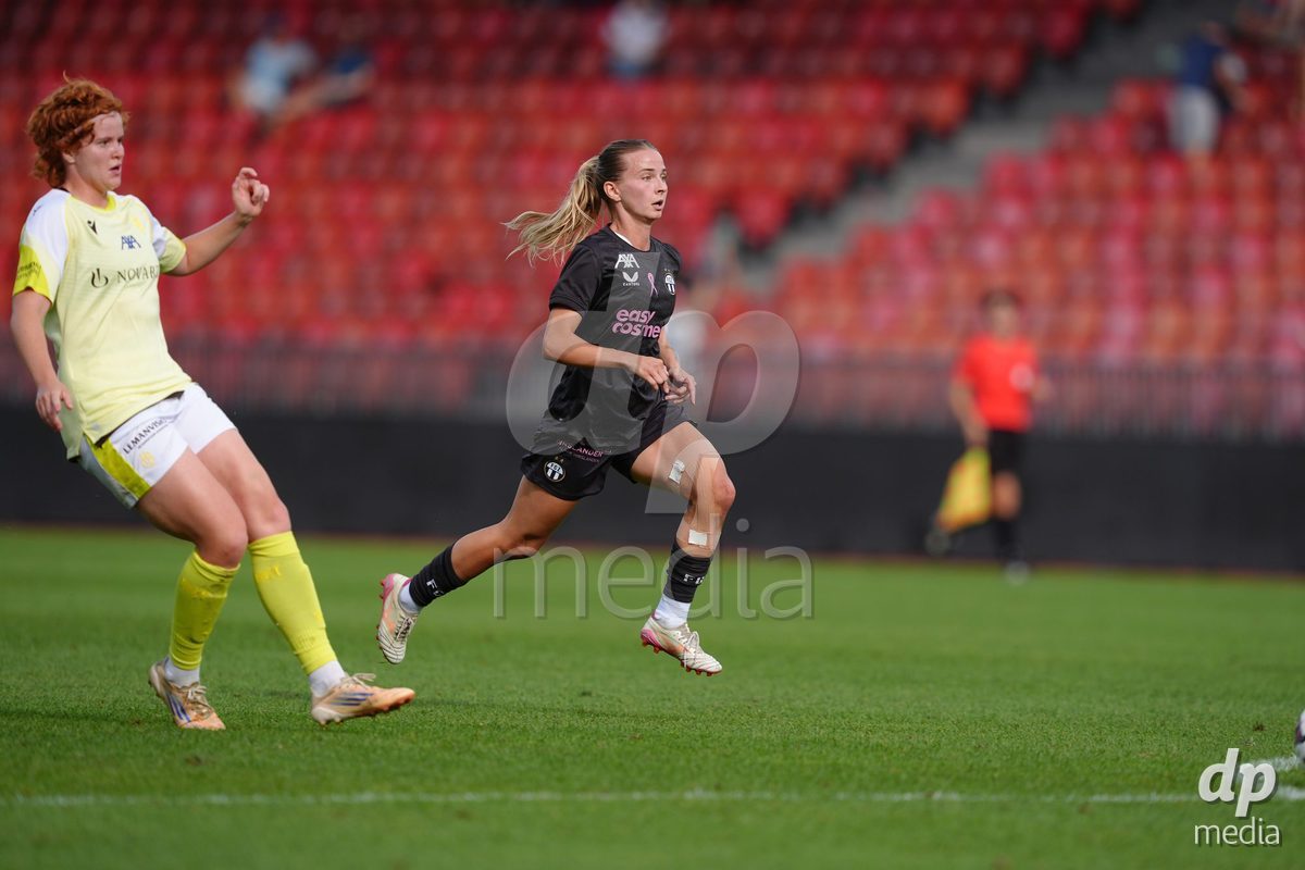 Zurich, Switzerland - September 13: Lena Maria Goppel of FC Basel 1893 against Kim Dubs of FC Zürich during the AXA Women's Super League match between FC Zurich and FC Basel 1893 at Stadion Letzigrund on September 13, 2026 in Zurich, Switzerland.