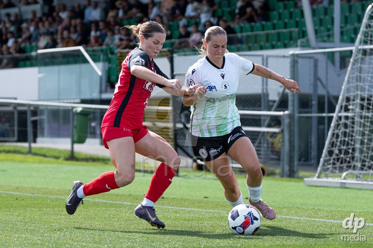 YVERDON-LES-BAINS - SWITZERLAND - SEPTEMBER 13 : Duel between Emeline von Dach of Yverdon Sport Women and Tabea Dorothee Maria Schütt of FC Aarau Frauen during the AXA Women's Super League match between Yverdon Sport Women and FC Aarau Frauen at Stade Municipal on September 13, 2026 in Yverdon-les-Bains, Switzerland.