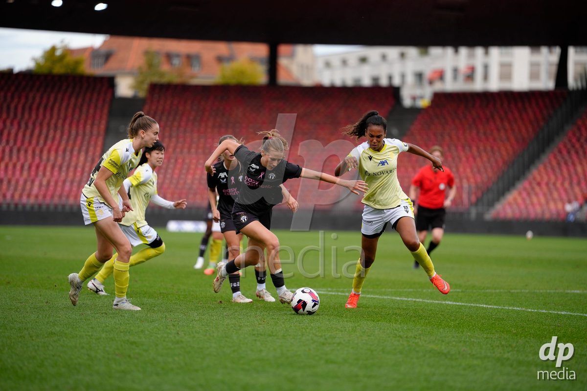 Zurich, Switzerland - September 13: Marlene Wild of FC Zürich against Coumba Louisa Sow and Carla Christen of FC Basel 1893 during the AXA Women's Super League match between FC Zurich and FC Basel 1893 at Stadion Letzigrund on September 13, 2026 in Zurich, Switzerland.