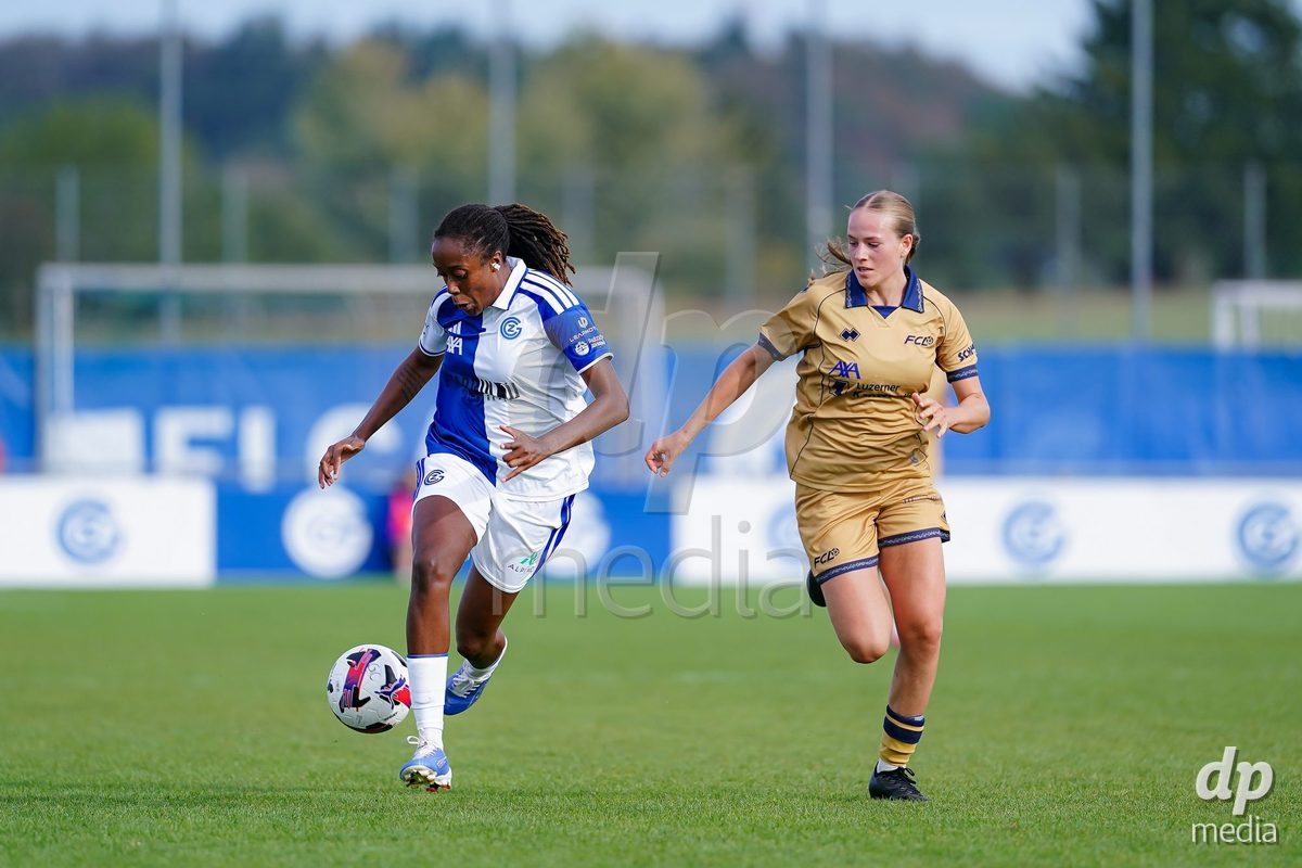 NIEDERHASLI, SWITZERLAND - September 13: Paige Bailey-Gayle of GC Frauenfussball (R) and Liel Rickenbach of FC Luzern (L) battle for the ball during the AXA Women's Super League match between GC Frauenfussball and FC Luzern at GC Campus on September 13, 2026 in Niederhasli, Switzerland.