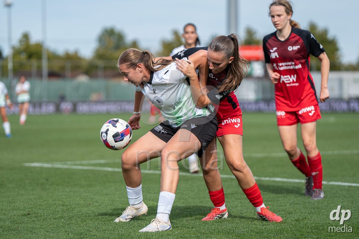YVERDON-LES-BAINS - SWITZERLAND - SEPTEMBER 13 : Denisa Hasanaj of Yverdon Sport Women portects the ball during the AXA Women's Super League match between Yverdon Sport Women and FC Aarau Frauen at Stade Municipal on September 13, 2026 in Yverdon-les-Bains, Switzerland.