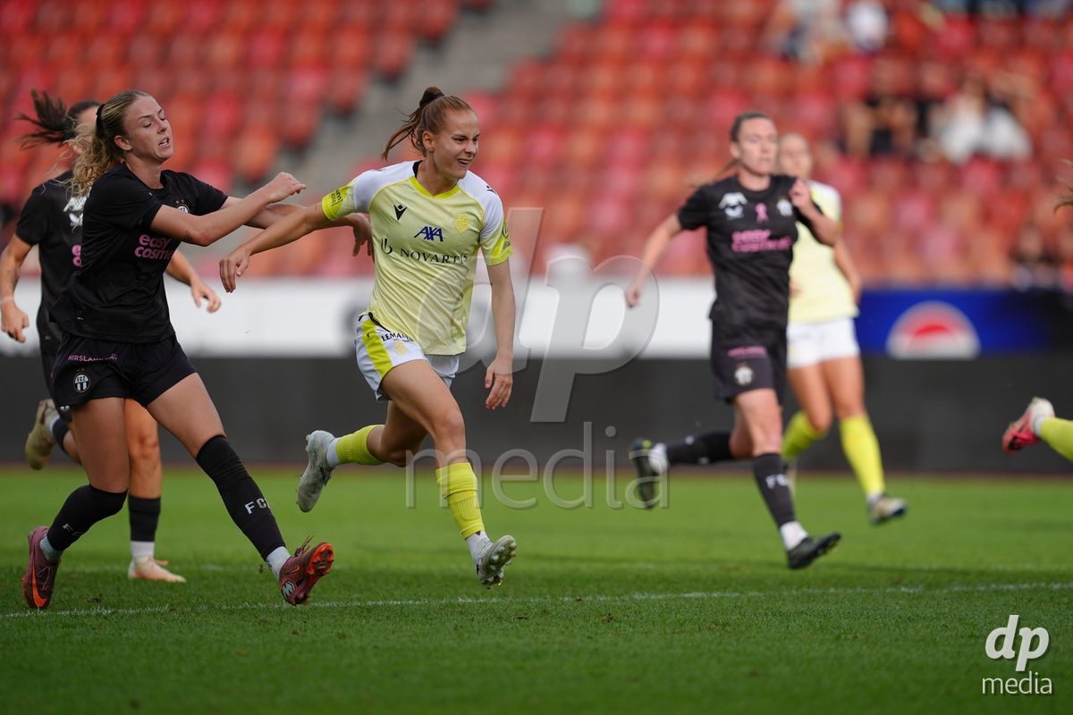 Zurich, Switzerland - September 13: Elea Hagmann of FC Basel 1893 against Briana Eads and Claire O'Riordan of FC Zürich during the AXA Women's Super League match between FC Zurich and FC Basel 1893 at Stadion Letzigrund on September 13, 2026 in Zurich, Switzerland.