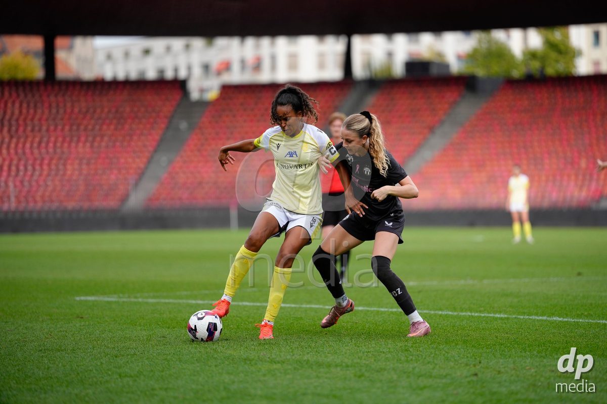 Zurich, Switzerland - September 13: Coumba Louisa Sow of FC Basel 1893 against Briana Eads of FC Zürich during the AXA Women's Super League match between FC Zurich and FC Basel 1893 at Stadion Letzigrund on September 13, 2026 in Zurich, Switzerland.