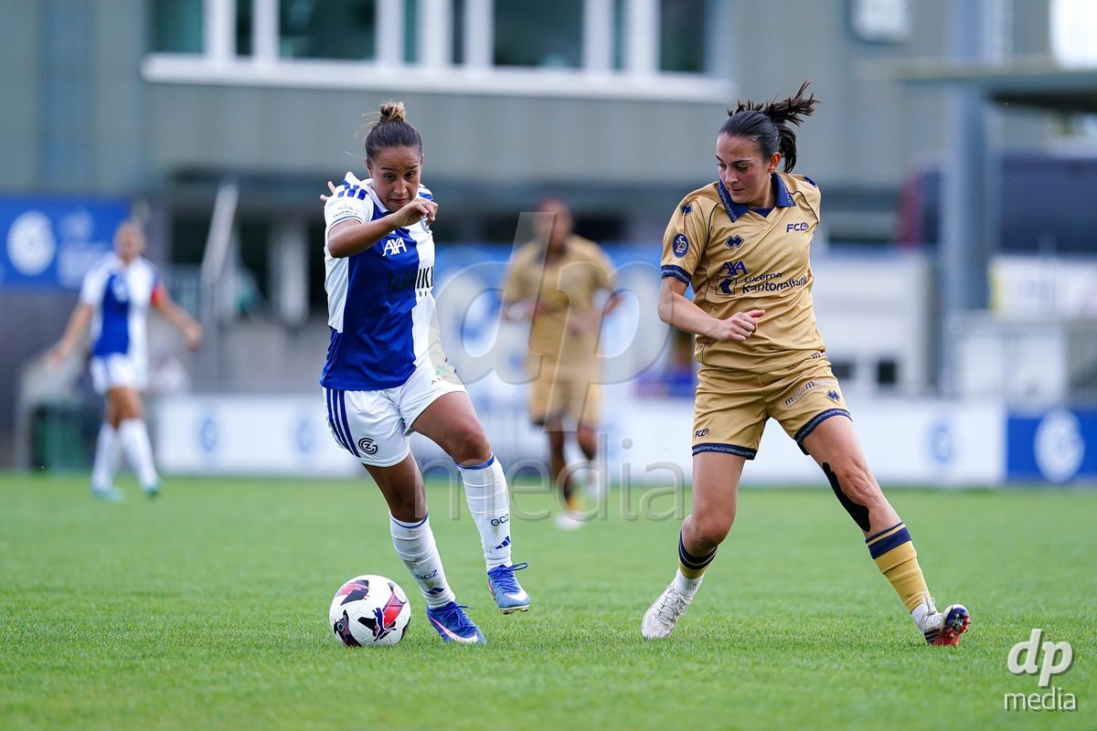 NIEDERHASLI, SWITZERLAND - September 13: Dalila Belen Ippolito of GC Frauenfussball (L) battles for the ball during the AXA Women's Super League match between GC Frauenfussball and FC Luzern at GC Campus on September 13, 2026 in Niederhasli, Switzerland.