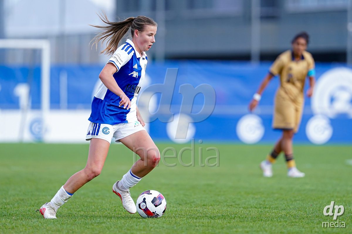 NIEDERHASLI, SWITZERLAND - September 13: Giulia Looser of GC Frauenfussball controls the ball during the AXA Women's Super League match between GC Frauenfussball and FC Luzern at GC Campus on September 13, 2026 in Niederhasli, Switzerland.