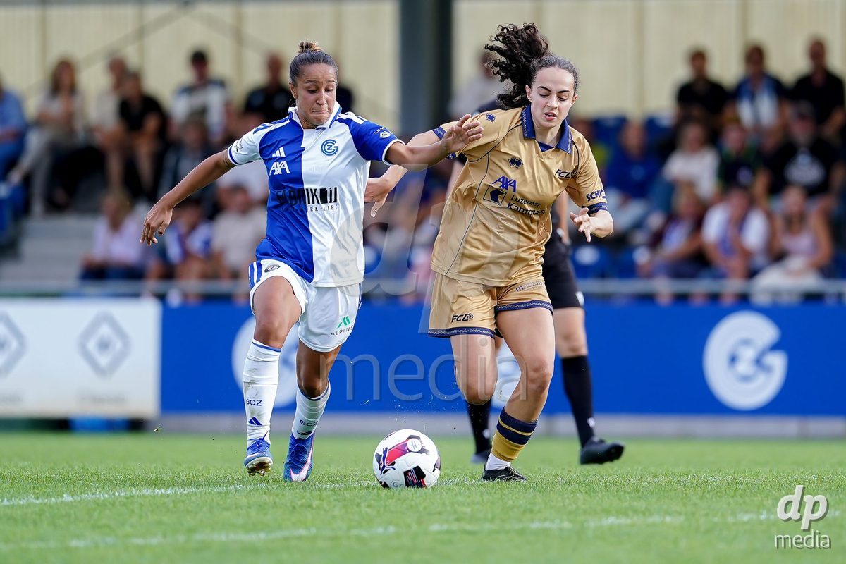 NIEDERHASLI, SWITZERLAND - September 13: Michelle Gigante of FC Luzern (R) and Dalila Belen Ippolito of GC Frauenfussball (L) battle for the ball during the AXA Women's Super League match between GC Frauenfussball and FC Luzern at GC Campus on September 13, 2026 in Niederhasli, Switzerland.
