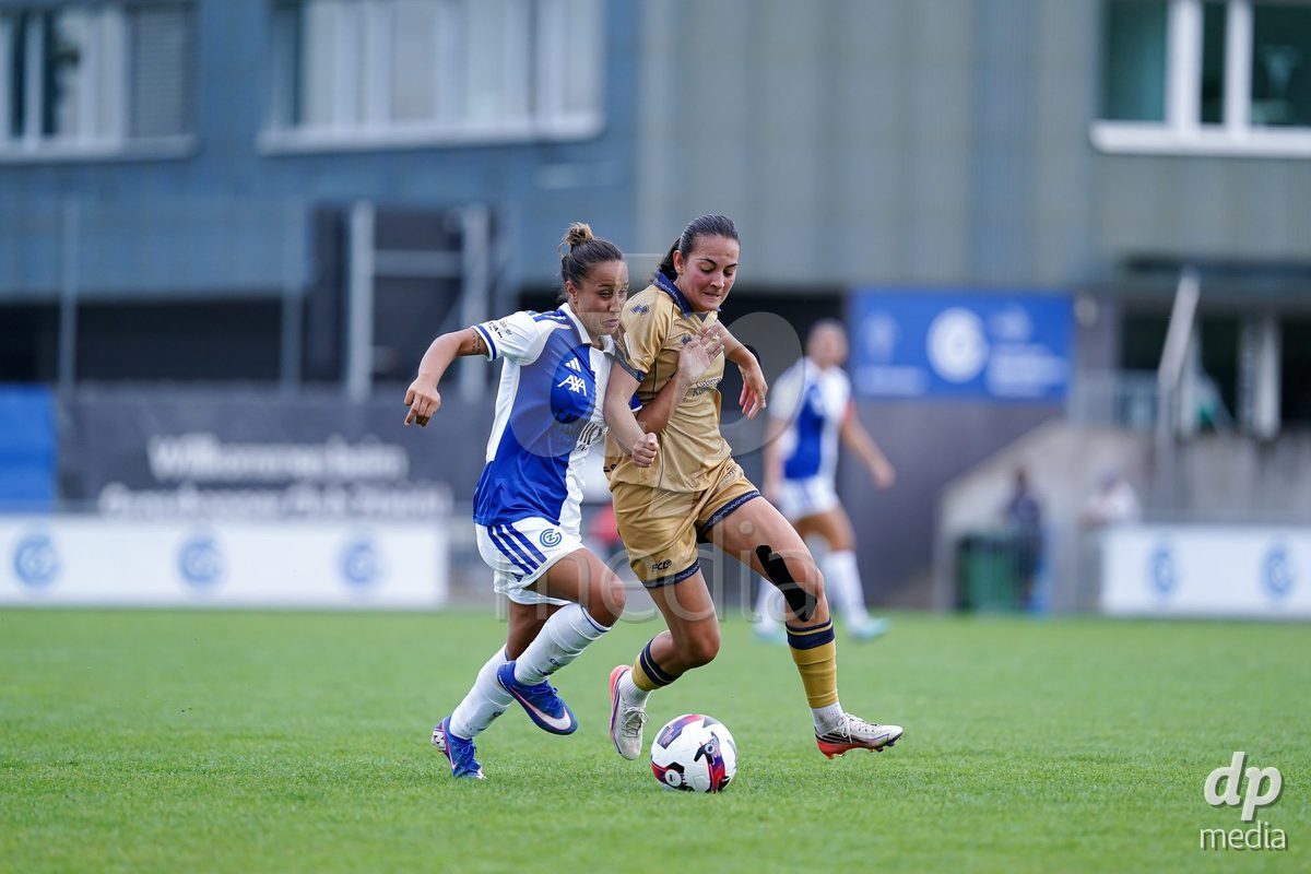 NIEDERHASLI, SWITZERLAND - September 13: Athanasia Moraitou of FC Luzern (R) and Dalila Belen Ippolito of GC Frauenfussball (L) battle for the ball during the AXA Women's Super League match between GC Frauenfussball and FC Luzern at GC Campus on September 13, 2026 in Niederhasli, Switzerland.