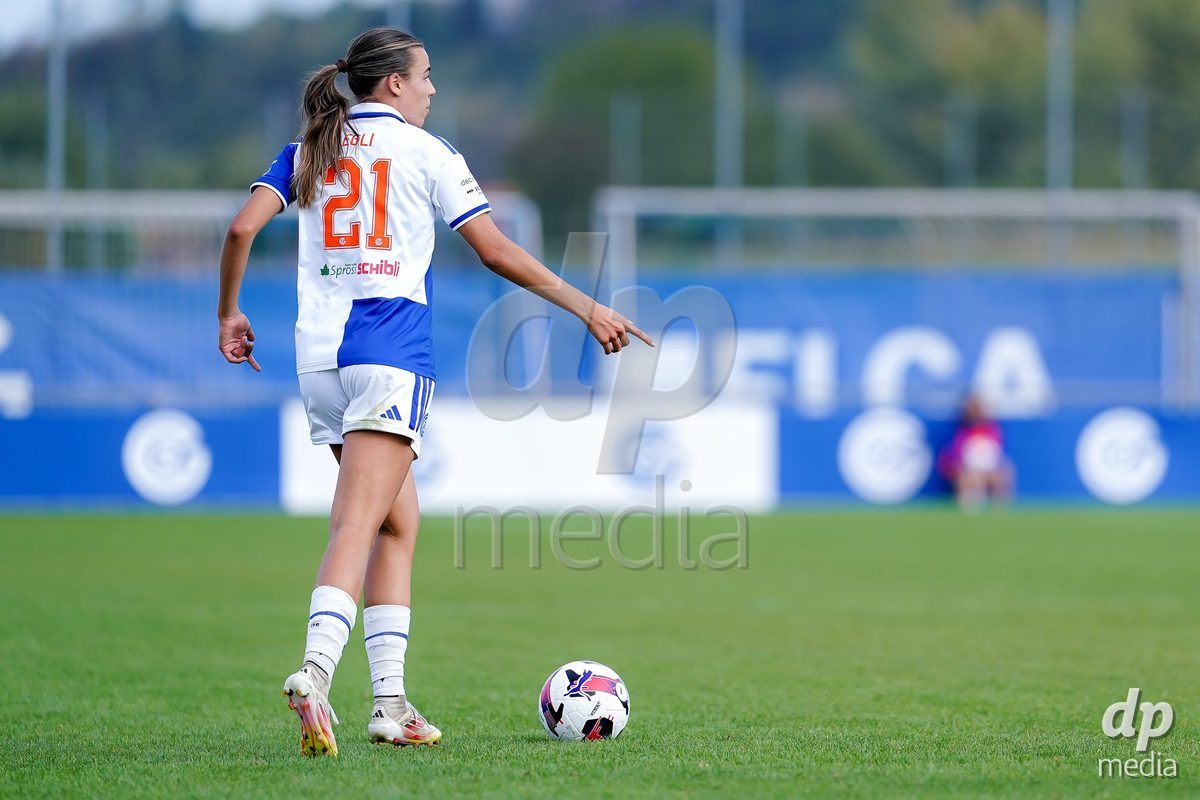 NIEDERHASLI, SWITZERLAND - September 13: Emma Egli of GC Frauenfussball controls the ball during the AXA Women's Super League match between GC Frauenfussball and FC Luzern at GC Campus on September 13, 2026 in Niederhasli, Switzerland.