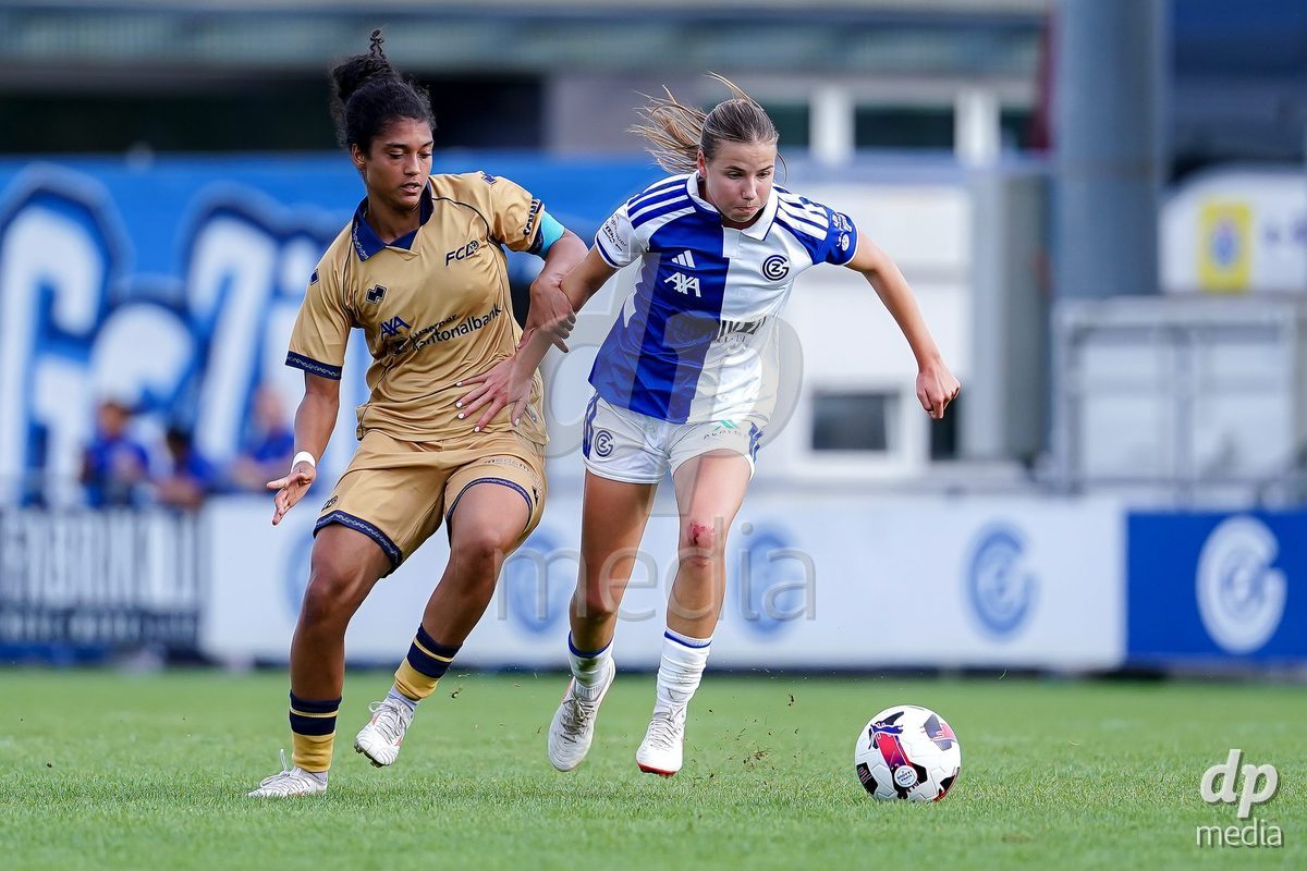NIEDERHASLI, SWITZERLAND - September 13: Giulia Looser of GC Frauenfussball (R) and Aldiana Amuchie of FC Luzern (L) battle for the ball during the AXA Women's Super League match between GC Frauenfussball and FC Luzern at GC Campus on September 13, 2026 in Niederhasli, Switzerland.