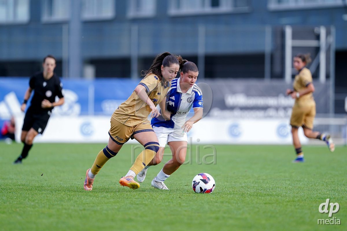 NIEDERHASLI, SWITZERLAND - September 13: Michelle Storni of GC Frauenfussball (R) and Melissa Rondalli of FC Luzern (L) battle for the ball during the AXA Women's Super League match between GC Frauenfussball and FC Luzern at GC Campus on September 13, 2026 in Niederhasli, Switzerland.