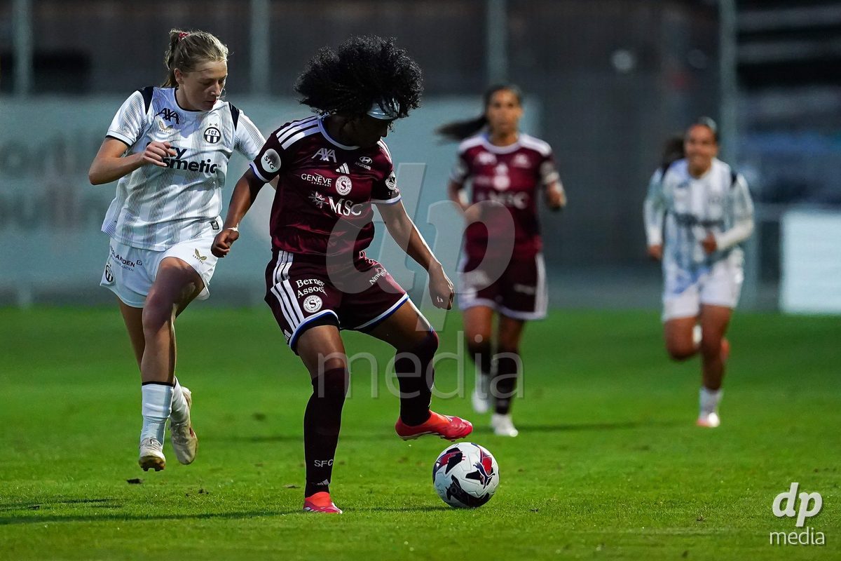 GENEVA, SWITZERLAND - SEPTEMBER 18: Mickaella Cardia (Mickaëlla Cardia) of Servette FC Chenois Feminin (R) and Marlene Wild of FC Zurich (L) battle for the ball during the AXA Women's Super League match between Servette FC Chenois Feminin and FC Zurich at Stade de Trois-Chene on September 18, 2026 in Geneva, Switzerland.