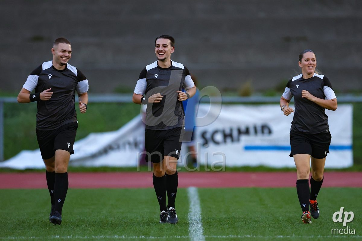 LUZERN, SWITZERLAND - SEPTEMBER 18: Alessio Feola (Schiedsrichter, m), Belinda Pierre-Brem (Schiedsrichter-Assistentin, r.) and Leonardo Patkovic (Schiedsrichter-Assisten) during the AXA Women's Super League match between FC Luzern and FC Yverdon Women at Hubelmatt on September 18, 2026 in Luzern, Switzerland.