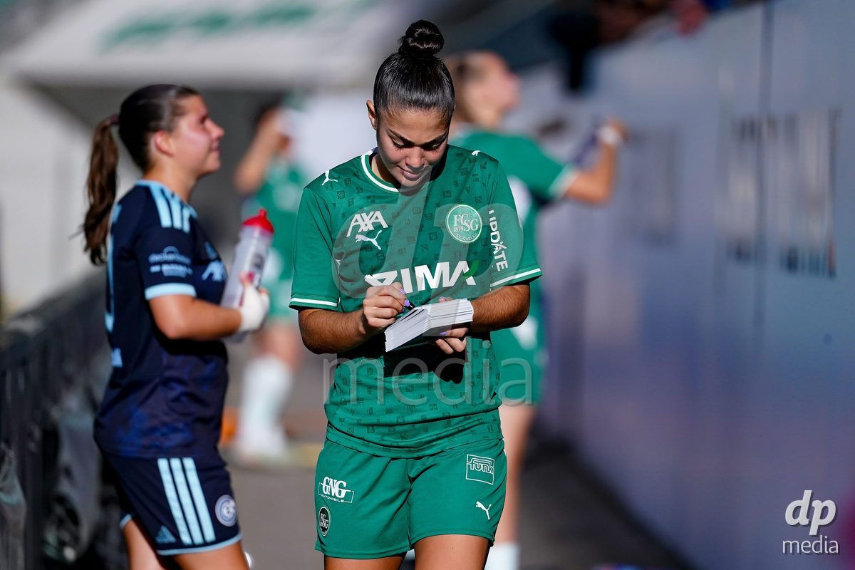 ST. GALLEN, SWITZERLAND - SEPTEMBER 19: Alessandra de Freitas of St.Gallen 1879 signing a card after the AXA Women's Super League match between FC St. Gallen 1879 and GC Frauenfussball at Berit Sitterstadion on September 19, 2026 in St. Gallen, Switzerland.
