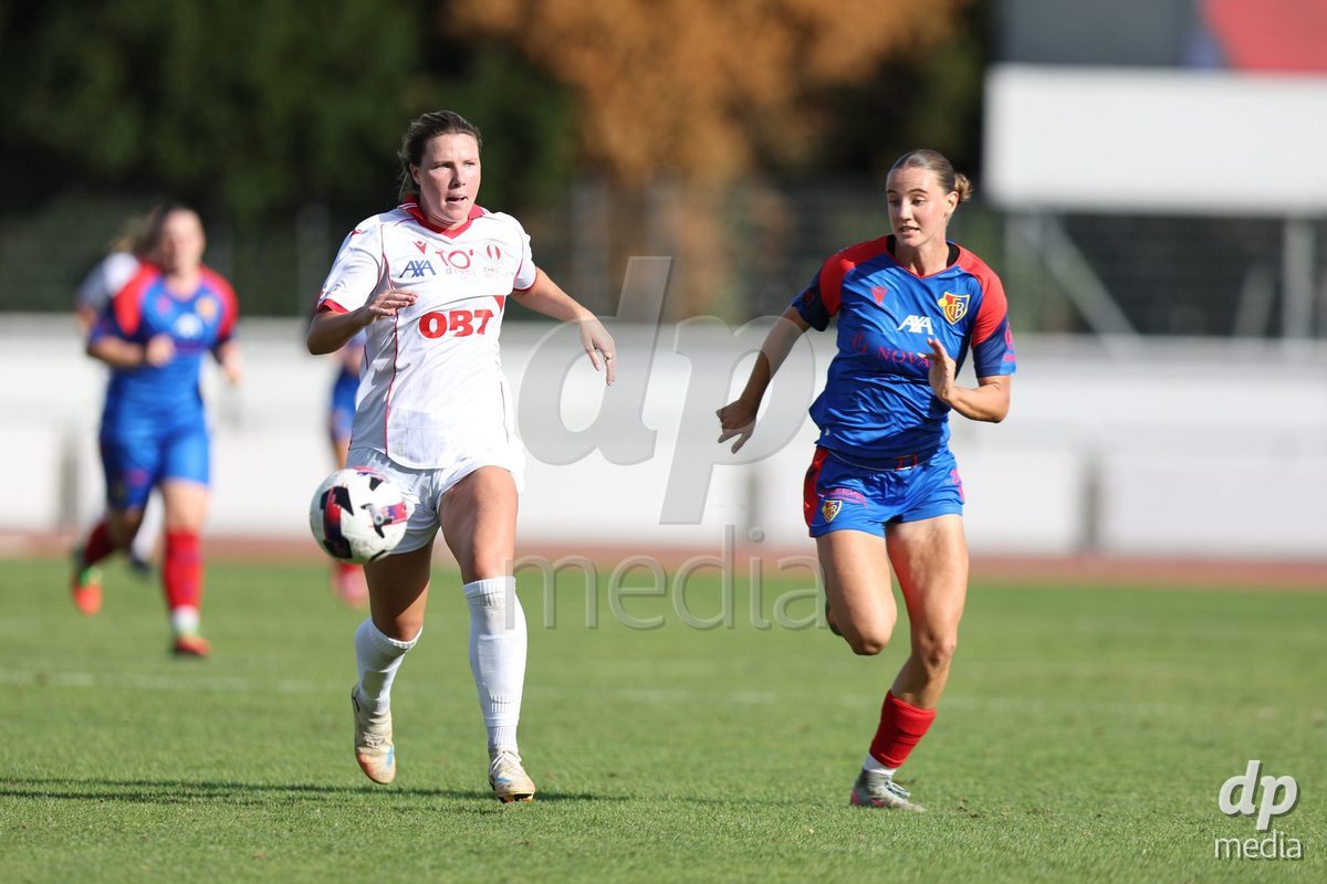 BASEL, SWITZERLAND - September 19: 33 Olivia Halina Borgen of FC Rapperswil-Jona and 26 Mia Franziska Bennewitz of FC Basel 1893 challenging with the ball during the AXA Women's Super League match between FC Basel and FC Rapperswil-Jona at Leichtathletik-stadion on September 19, 2026 in Basel, Switzerland.