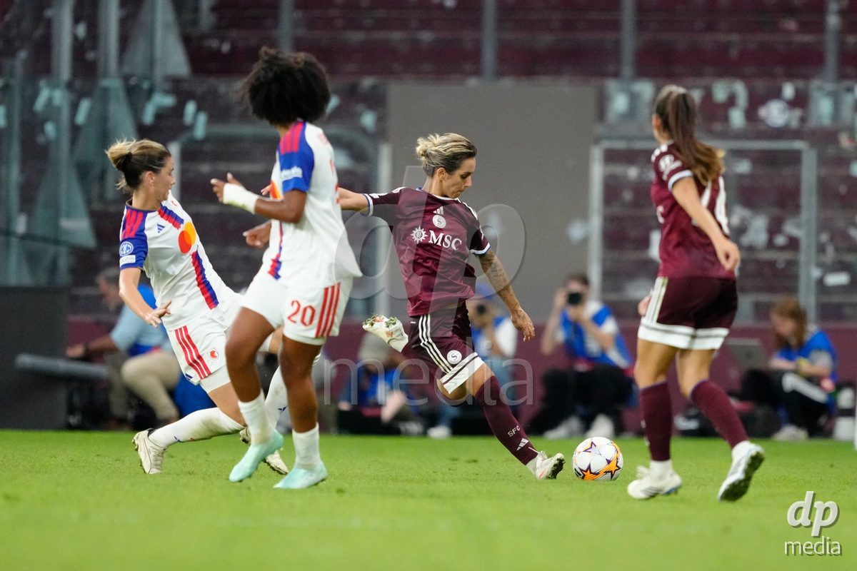 GENEVA, SWITZERLAND - SEPTEMBER 23: Natasa Andonova of Servette FC Chenois Feminin against Damaris Egurrola of Olympique Lyon during the UEFA Women's Champions League match between Servette FC Chenois Feminin and OL Lyonnes at Stade de Geneve on September 23, 2026 in Geneva, Switzerland.