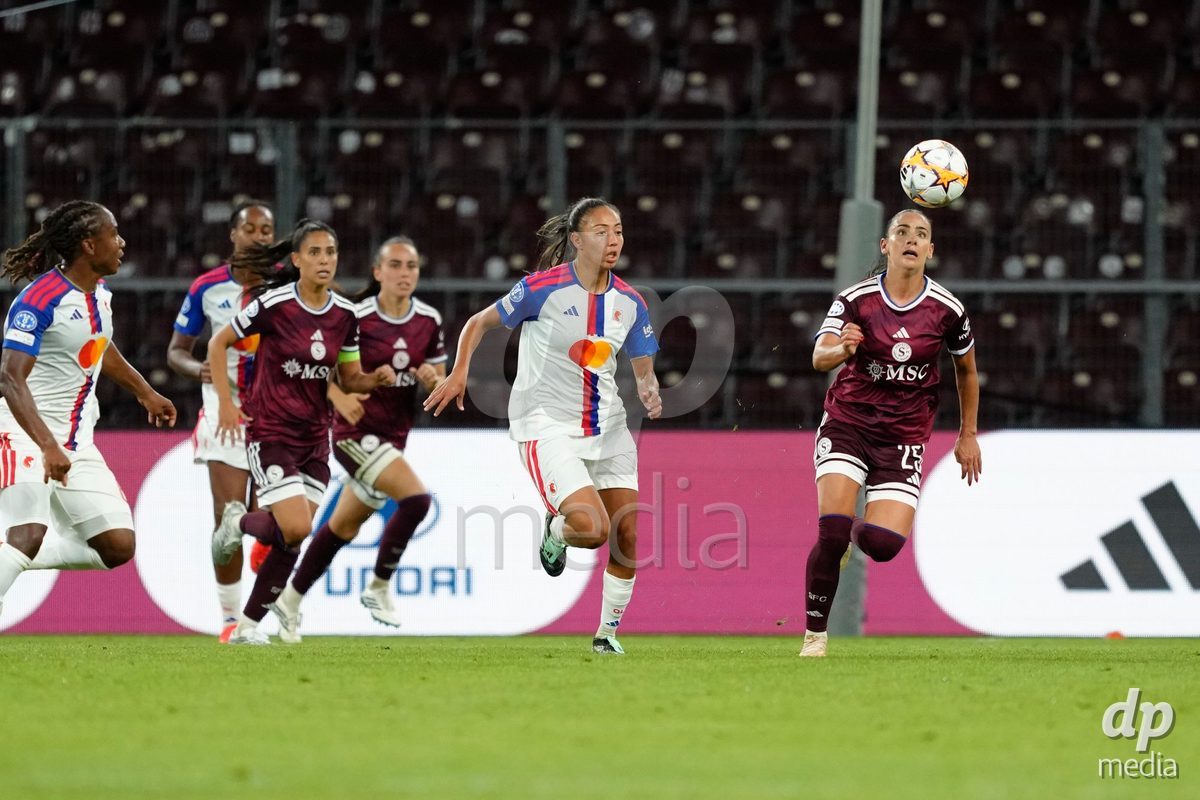 GENEVA, SWITZERLAND - SEPTEMBER 23: Meriame Terchoun of Servette FC Chenois Feminin against Selma Bacha and Marie-Antoinette Katoto of Olympique Lyon during the UEFA Women's Champions League match between Servette FC Chenois Feminin and OL Lyonnes at Stade de Geneve on September 23, 2026 in Geneva, Switzerland.