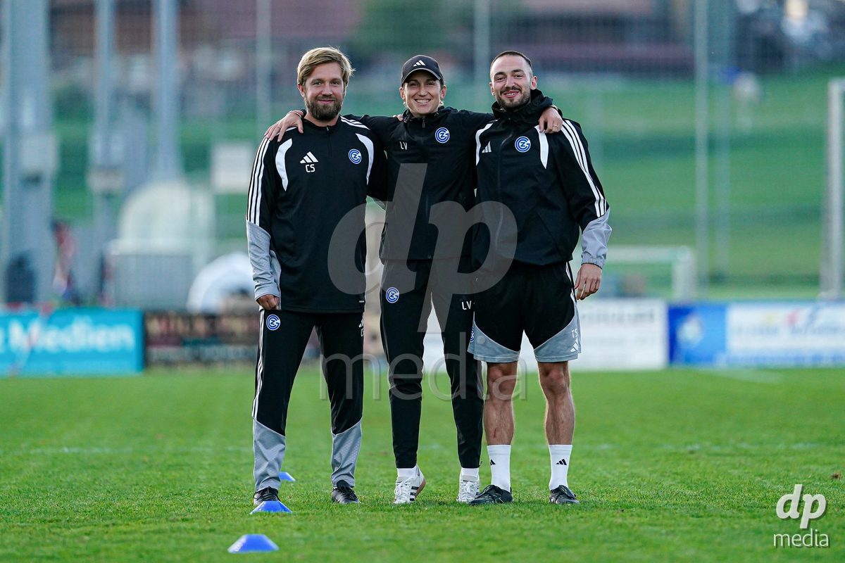 WÄDENSWIL, SWITZERLAND - SEPTEMBER 25: Thiago Semadeni (R), Laura Vetterlein, Head Coach of GC Frauenfussball (M), and Cristoph Schliewe (L) during the AXA Women's Cup match between FC Wädenswil 1 and GC Frauenfussball at Sportplatz Beichlen on September 25, 2026 in Wädenswil.