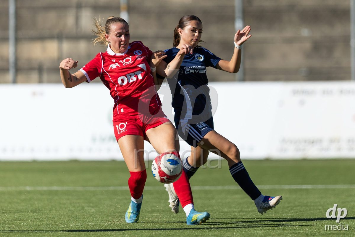CAROUGE, SWITZERLAND - SEPTEMBER 27: 19 Tamara Saric of FC Rapperswil-Jona and 3 Alicia Dos Santos of Etoile Carouge FC challenging with the ball during the AXA Women's Cup match between Etoile Carouge FC and FC Rapperswil-Jona at Stade de la Fontenette on September 27, 2026 in Carouge, Switzerland.