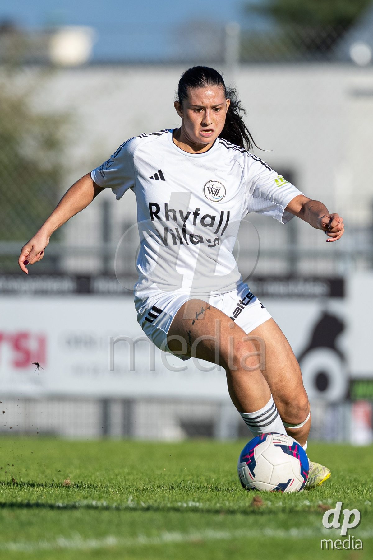 COPPET, SWITZERLAND - SEPTEMBER 27: FC Wil player drives the ball during the AXA Women's Cup match between US Terre Sainte and FC Wil 1900 at Centre sportif des Rojalets on September 27, 2026 in Coppet, Switzerland.