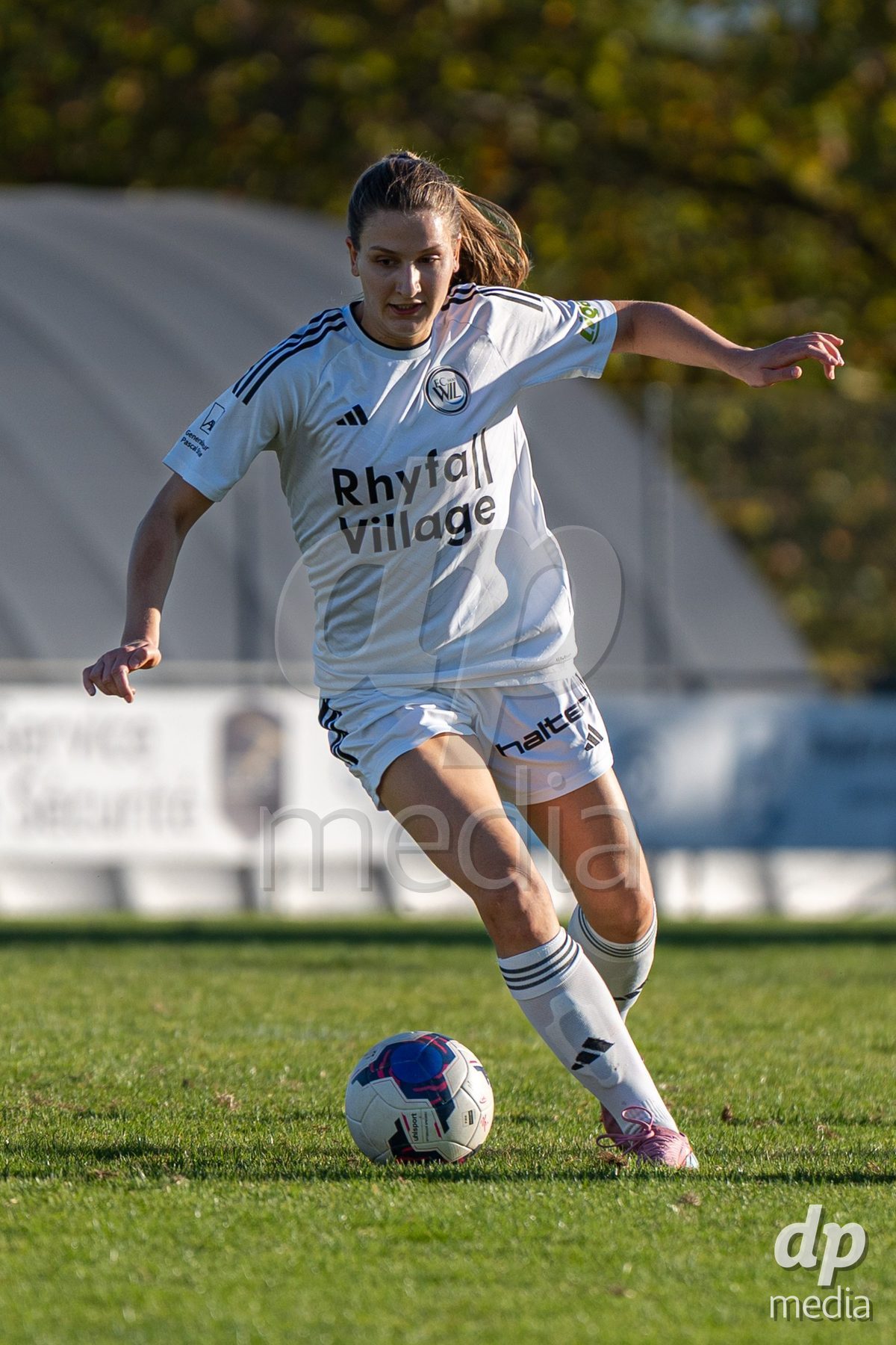 COPPET, SWITZERLAND - SEPTEMBER 27: FC Wil player dribbles during the AXA Women's Cup match between US Terre Sainte and FC Wil 1900 at Centre sportif des Rojalets on September 27, 2026 in Coppet, Switzerland.