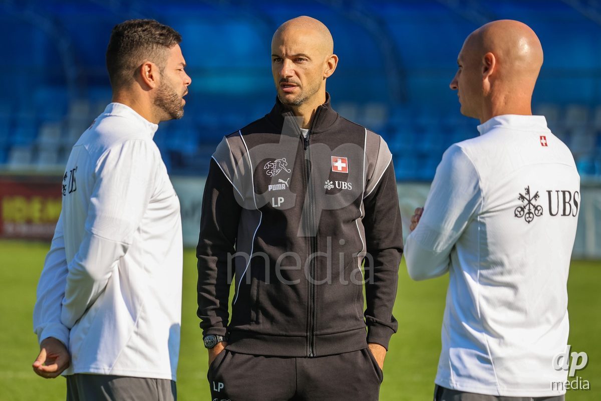 DUNAJSKA LUZNA, SLOVAKIA - SEPTEMBER 28: Switzerland crew members inspection the International Friendly football match between Kazakhstan U19 and Switzerland U19 on September 28, 2026 in Dunajska Luzna, Slovakia.
