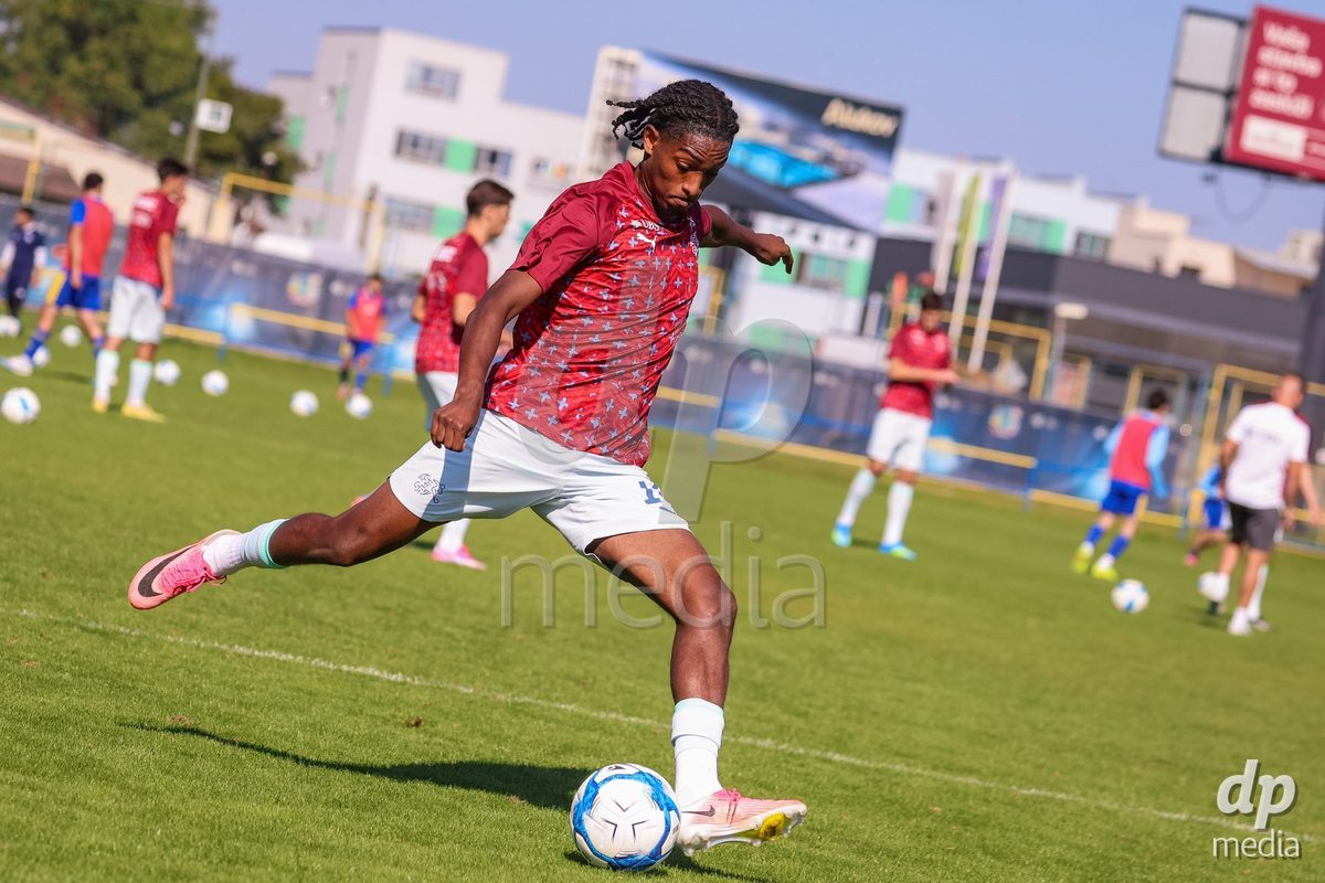 DUNAJSKA LUZNA, SLOVAKIA - SEPTEMBER 28: Switzerland team warm-up the International Friendly football match between Kazakhstan U19 and Switzerland U19 on September 28, 2026 in Dunajska Luzna, Slovakia.