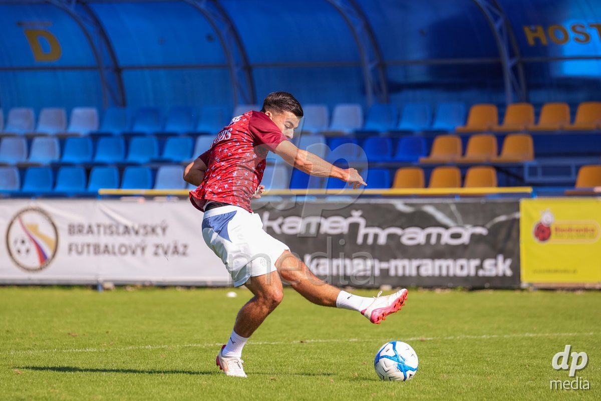 DUNAJSKA LUZNA, SLOVAKIA - SEPTEMBER 28: Switzerland team warm-up the International Friendly football match between Kazakhstan U19 and Switzerland U19 on September 28, 2026 in Dunajska Luzna, Slovakia.