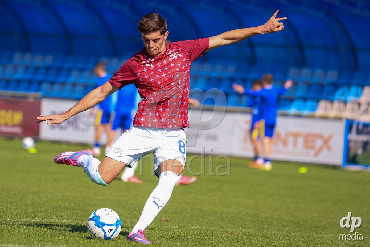 DUNAJSKA LUZNA, SLOVAKIA - SEPTEMBER 28: Switzerland team warm-up the International Friendly football match between Kazakhstan U19 and Switzerland U19 on September 28, 2026 in Dunajska Luzna, Slovakia.