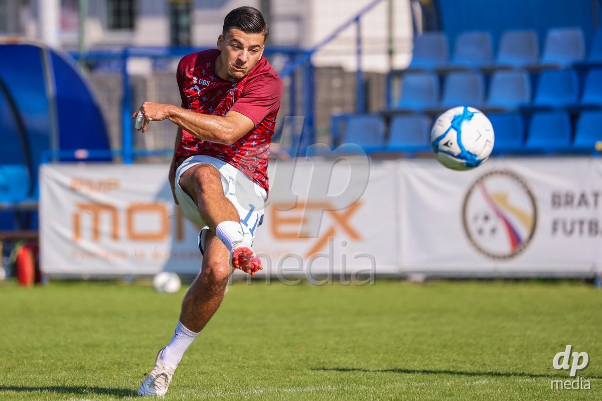 DUNAJSKA LUZNA, SLOVAKIA - SEPTEMBER 28: Switzerland team warm-up the International Friendly football match between Kazakhstan U19 and Switzerland U19 on September 28, 2026 in Dunajska Luzna, Slovakia.