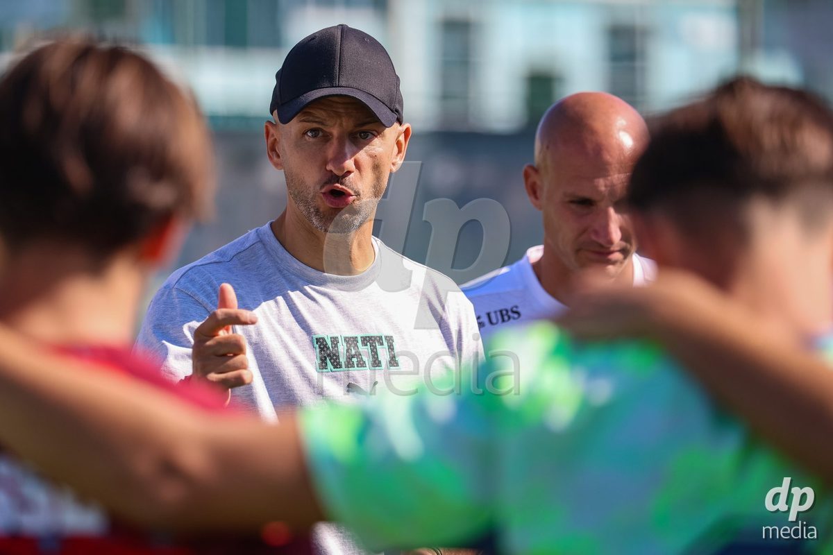 DUNAJSKA LUZNA, SLOVAKIA - SEPTEMBER 28: Switzerland coach Luigi Pisino delight  the International Friendly football match between Kazakhstan U19 and Switzerland U19 on September 28, 2026 in Dunajska Luzna, Slovakia.