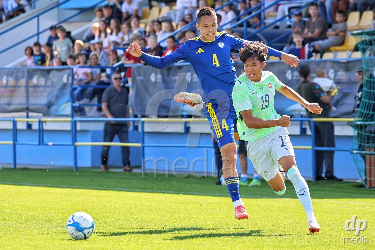 DUNAJSKA LUZNA, SLOVAKIA - SEPTEMBER 28:  Norbu Lhakpa 19 controls the balll during the friendly international football match between Kazakhstan U19 and Switzerland U19 on September 28, 2026 in Dunajska Luzna, Slovakia.