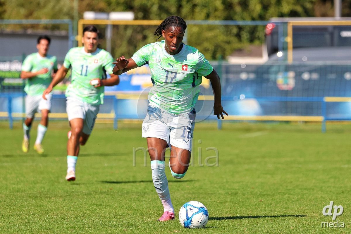 DUNAJSKA LUZNA, SLOVAKIA - SEPTEMBER 28: Josiah Seyfu 17 of Switzerland controls the ball during the friendly international football match between Kazakhstan U19 and Switzerland U19 on September 28, 2026 in Dunajska Luzna, Slovakia.
