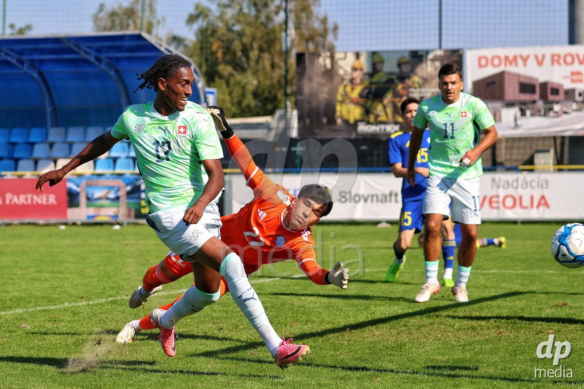 DUNAJSKA LUZNA, SLOVAKIA - SEPTEMBER 28: Josiah Seyfu 17 of Switzerland shoots on goal during the friendly international football match between Kazakhstan U19 and Switzerland U19 on September 28, 2026 in Dunajska Luzna, Slovakia.