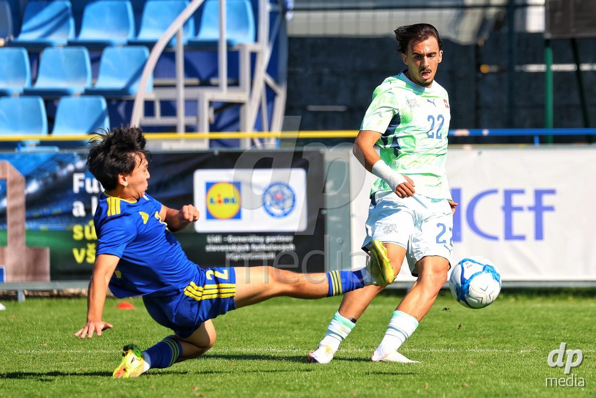 DUNAJSKA LUZNA, SLOVAKIA - SEPTEMBER 28: Adrien Llukes 22 of Switzerland controls the ball during the International Friendly football match between Kazakhstan U19 and Switzerland U19 on September 28, 2026 in Dunajska Luzna, Slovakia.