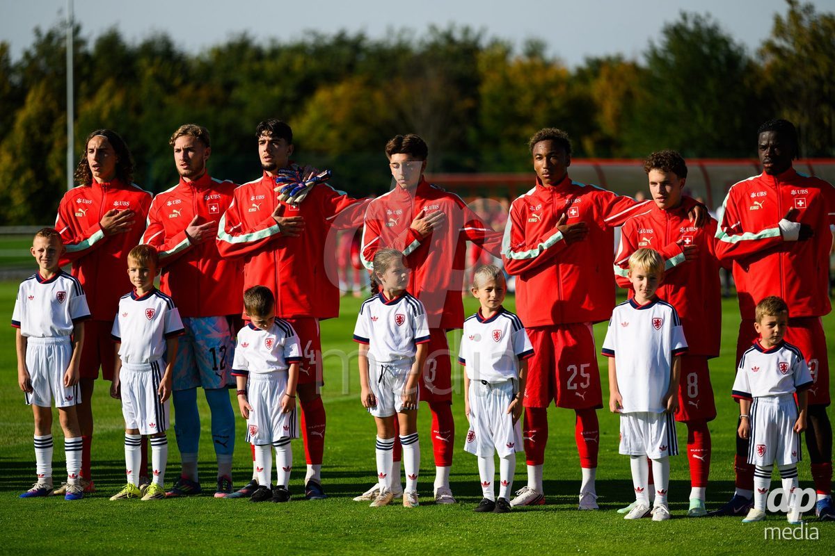 KOSMONSY, CZECH REPUBLIC - SEPTEMBER 28: The Swiss teams during the national anthem during  the International Friendly match between Czech Republic U18 and Switzerland U18 on September 28, 2026 in Kosmonsy, Czech Republic.