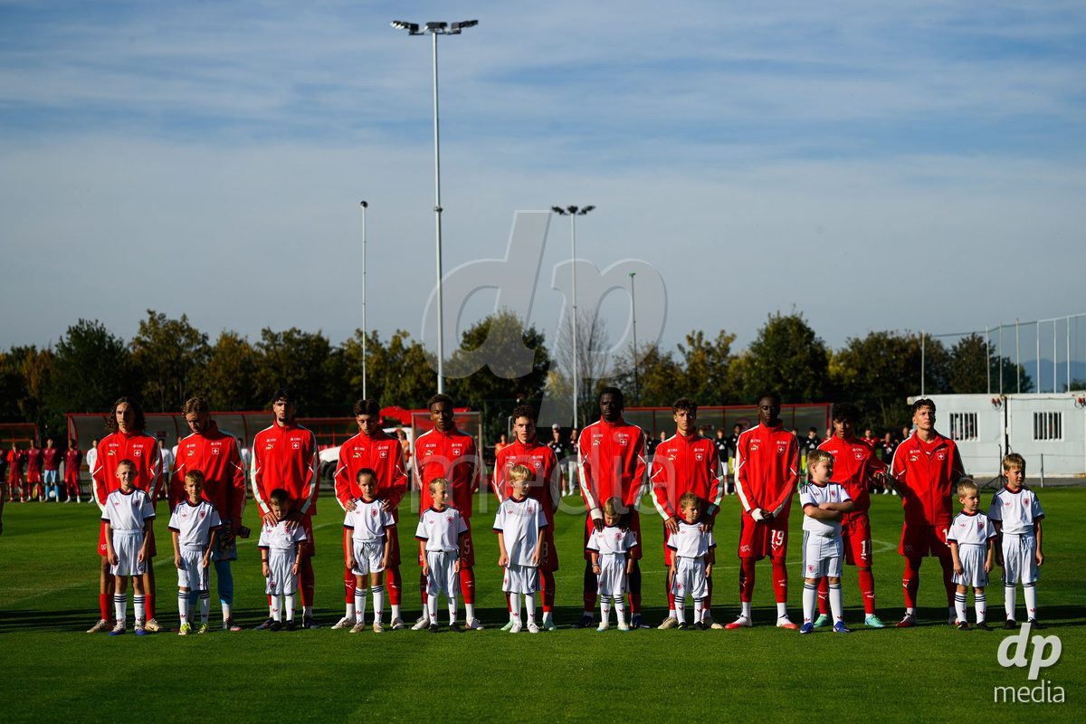 KOSMONSY, CZECH REPUBLIC - SEPTEMBER 28: The Swiss teams during the national anthem during  the International Friendly match between Czech Republic U18 and Switzerland U18 on September 28, 2026 in Kosmonsy, Czech Republic.