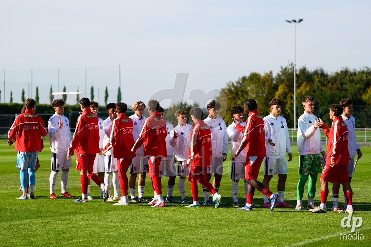 KOSMONSY, CZECH REPUBLIC - SEPTEMBER 28: The Czech and Swiss teams greet each other during the national anthem during  the International Friendly match between Czech Republic U18 and Switzerland U18 on September 28, 2026 in Kosmonsy, Czech Republic.