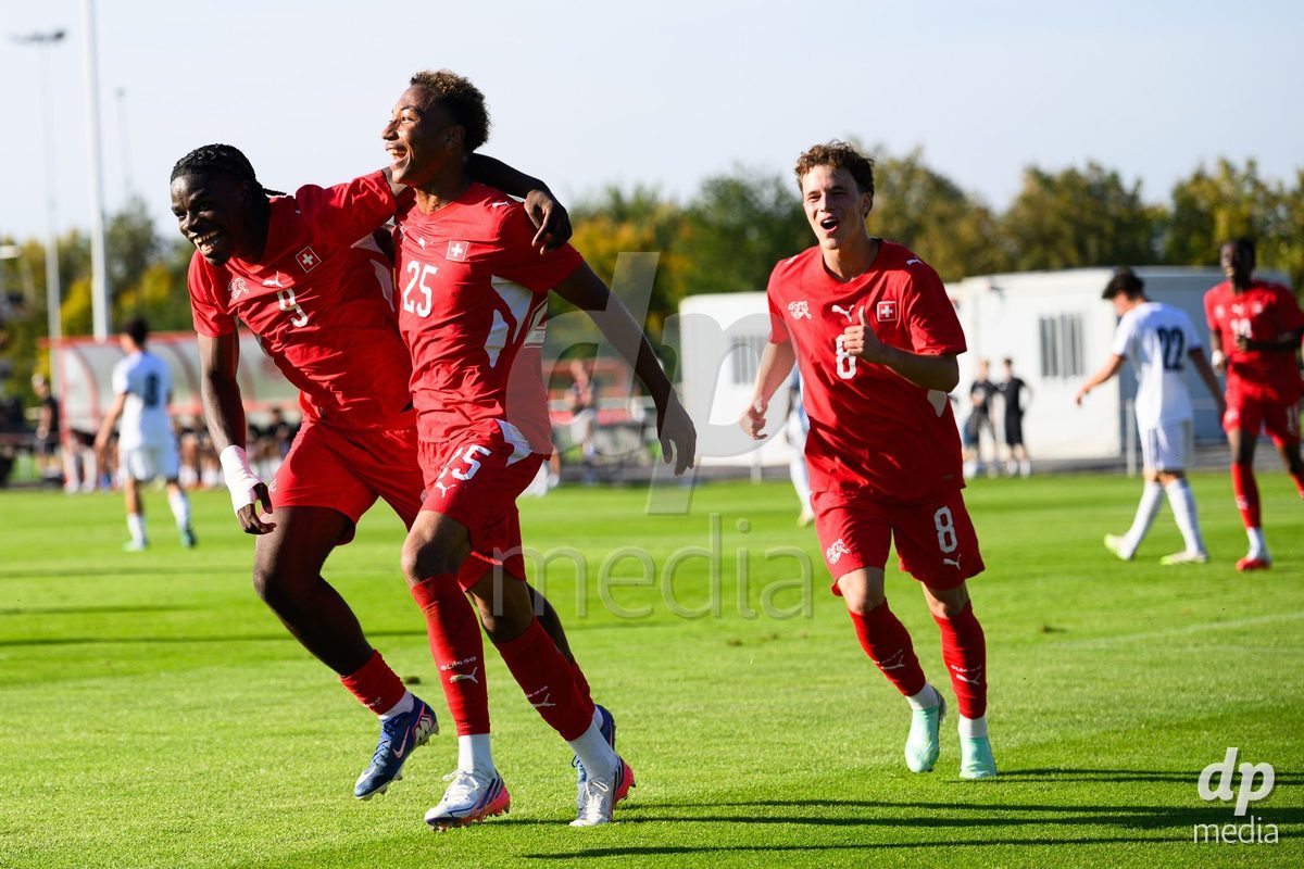 KOSMONSY, CZECH REPUBLIC - SEPTEMBER 28: Shedrach Ogbodu (left), Mathis Dind and Stefan Furundzic of Switzerland celebrate the opening goal during the International Friendly match between Czech Republic U18 and Switzerland U18 on September 28, 2026 in Kosmonsy, Czech Republic.