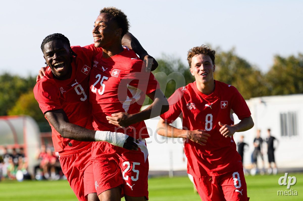 KOSMONSY, CZECH REPUBLIC - SEPTEMBER 28: Shedrach Ogbodu (left), Mathis Dind and Stefan Furundzic of Switzerland celebrate the opening goal during the International Friendly match between Czech Republic U18 and Switzerland U18 on September 28, 2026 in Kosmonsy, Czech Republic.