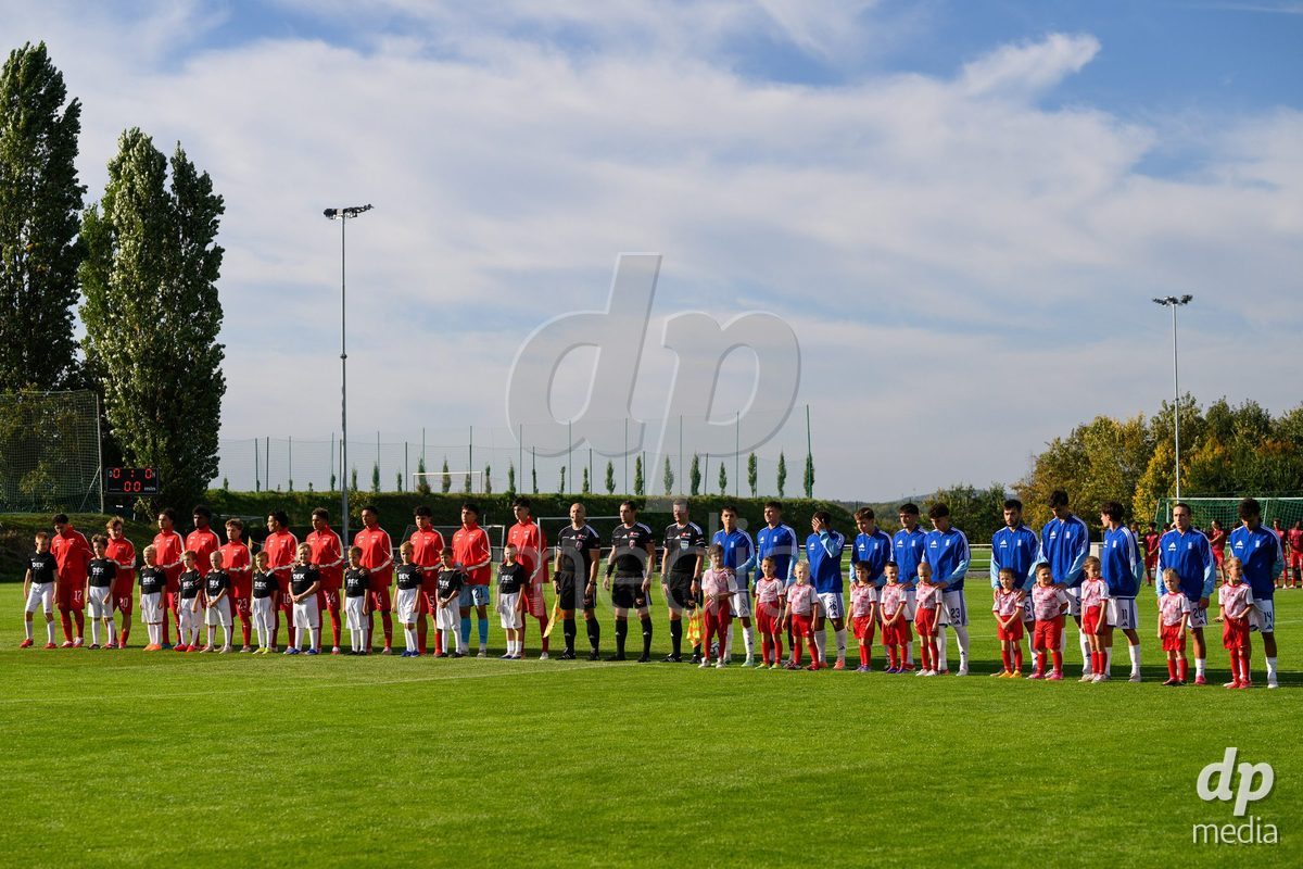 KOSMONSY, CZECH REPUBLIC - SEPTEMBER 30: The Swiss and Greece teams during the national anthem during  the International Friendly match between Switzerland U18 and Greece U18 on September 30, 2026 in Kosmonsy, Czech Republic.