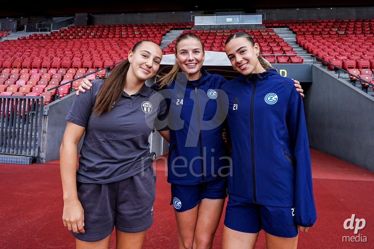 ZURICH, SWITZERLAND - OCTOBER 2: Janina Egli of FC Zurich, Giulia Looser of Grasshopper Club Zurich and Emma Egli of Grasshopper Club Zurich (L-R) at arrival ahead of the AXA Women's Super League match between GC Frauenfussball and FC Zurich at Letzigrund on October 2, 2026 in Zurich, Switzerland.