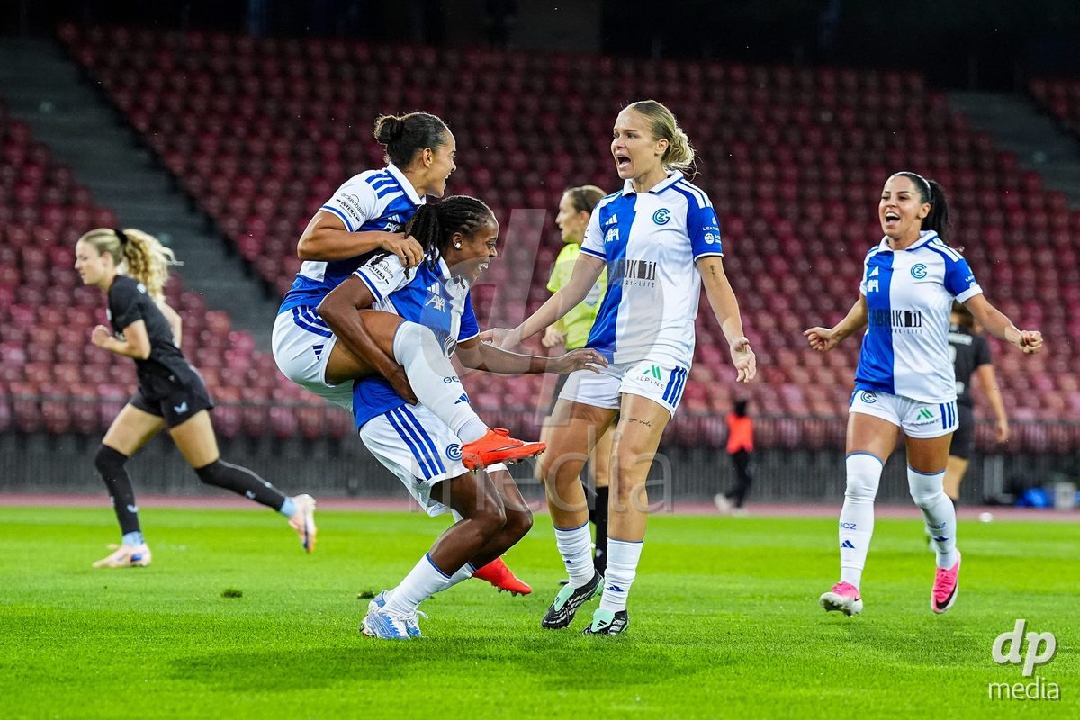 ZURICH, SWITZERLAND - OCTOBER 2: Kayla Mckenna of Grasshopper Club Zurich celebrates with teammates after scoring her teams first goal during the AXA Women's Super League match between GC Frauenfussball and FC Zurich at Letzigrund on October 2, 2026 in Zurich, Switzerland.