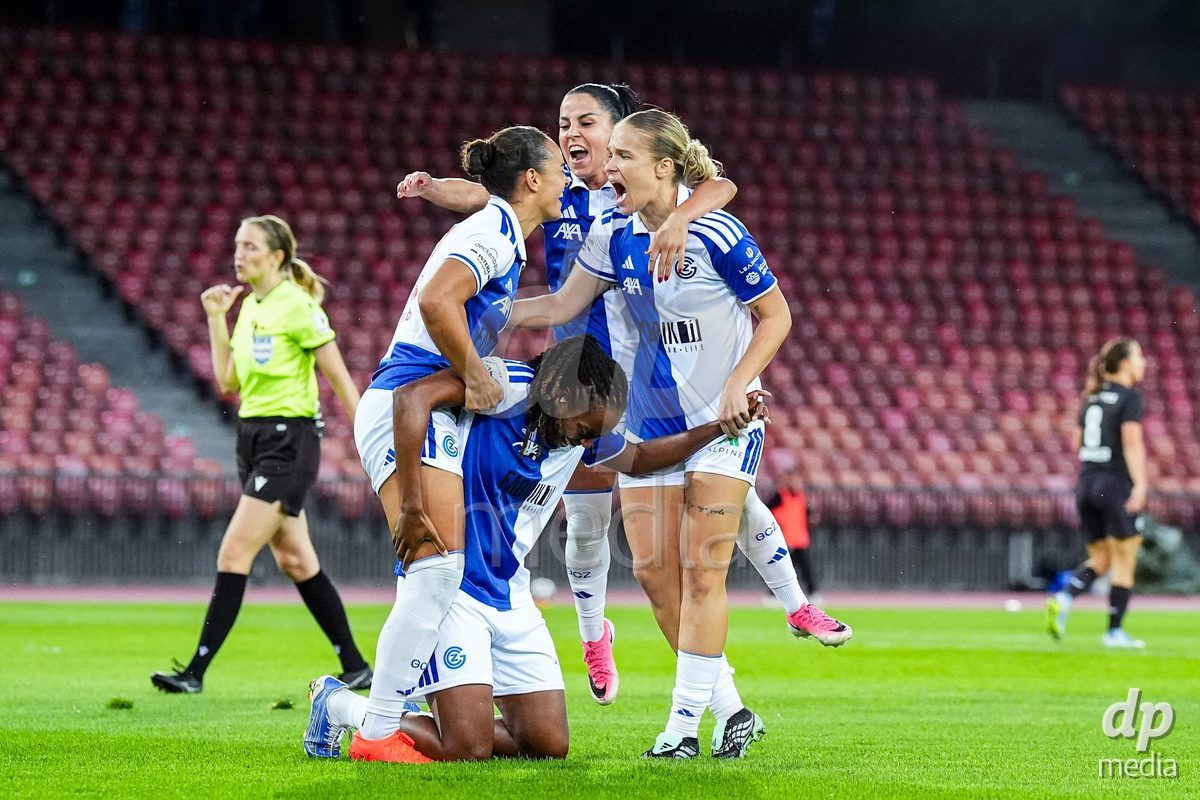 ZURICH, SWITZERLAND - OCTOBER 2: Kayla Mckenna of Grasshopper Club Zurich (L) celebrates with teammates after scoring her teams first goal during the AXA Women's Super League match between GC Frauenfussball and FC Zurich at Letzigrund on October 2, 2026 in Zurich, Switzerland.