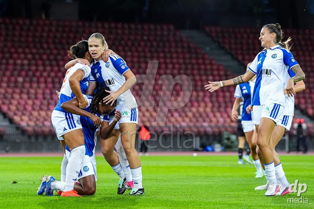 ZURICH, SWITZERLAND - OCTOBER 2: Kayla Mckenna of Grasshopper Club Zurich (L) celebrates with teammates after scoring her teams first goal during the AXA Women's Super League match between GC Frauenfussball and FC Zurich at Letzigrund on October 2, 2026 in Zurich, Switzerland.