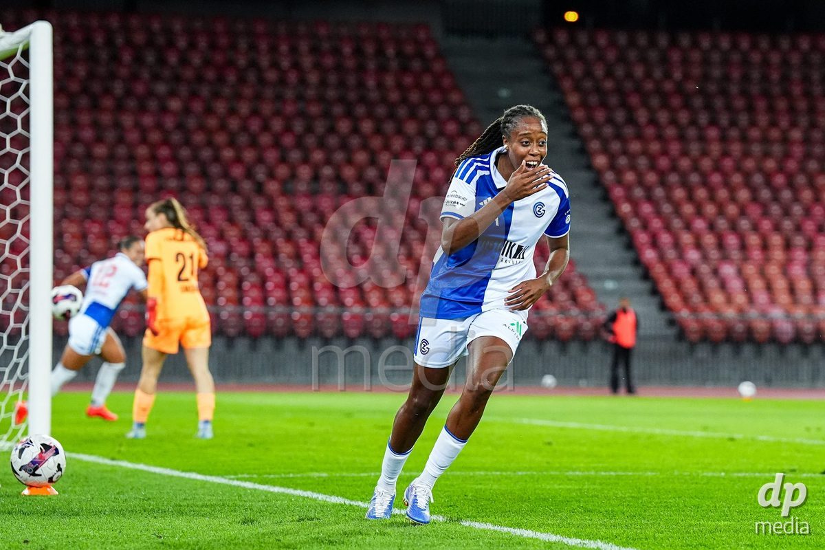 ZURICH, SWITZERLAND - OCTOBER 2:  Paige Bailey-Gayle of Grasshopper Club Zurich celebrates her teammates fourth team goal Kayla Mckenna of Grasshopper Club Zurich the ball during the AXA Women's Super League match between GC Frauenfussball and FC Zurich at Letzigrund on October 2, 2026 in Zurich, Switzerland.