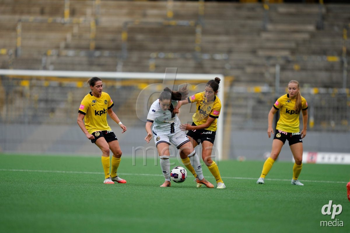 BERN, SWITZERLAND - OCTOBER 3: Giulia Schlup (19 YB Frauen), Noa Linn Munger (8 YB Frauen) and Wibke Meister (18 YB Frauen) against Melissa Rondalli (21 FCL) during the AXA Women's Super League match between BSC YB Frauen and FC Luzern at Wankdorf Stadion on October 3, 2026 in Bern, Switzerland.